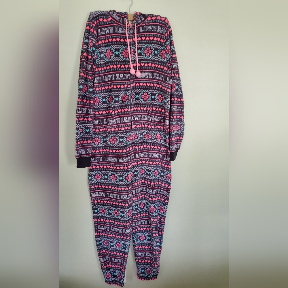 One piece fuzzy pajamas with a hood and pockets. Size L